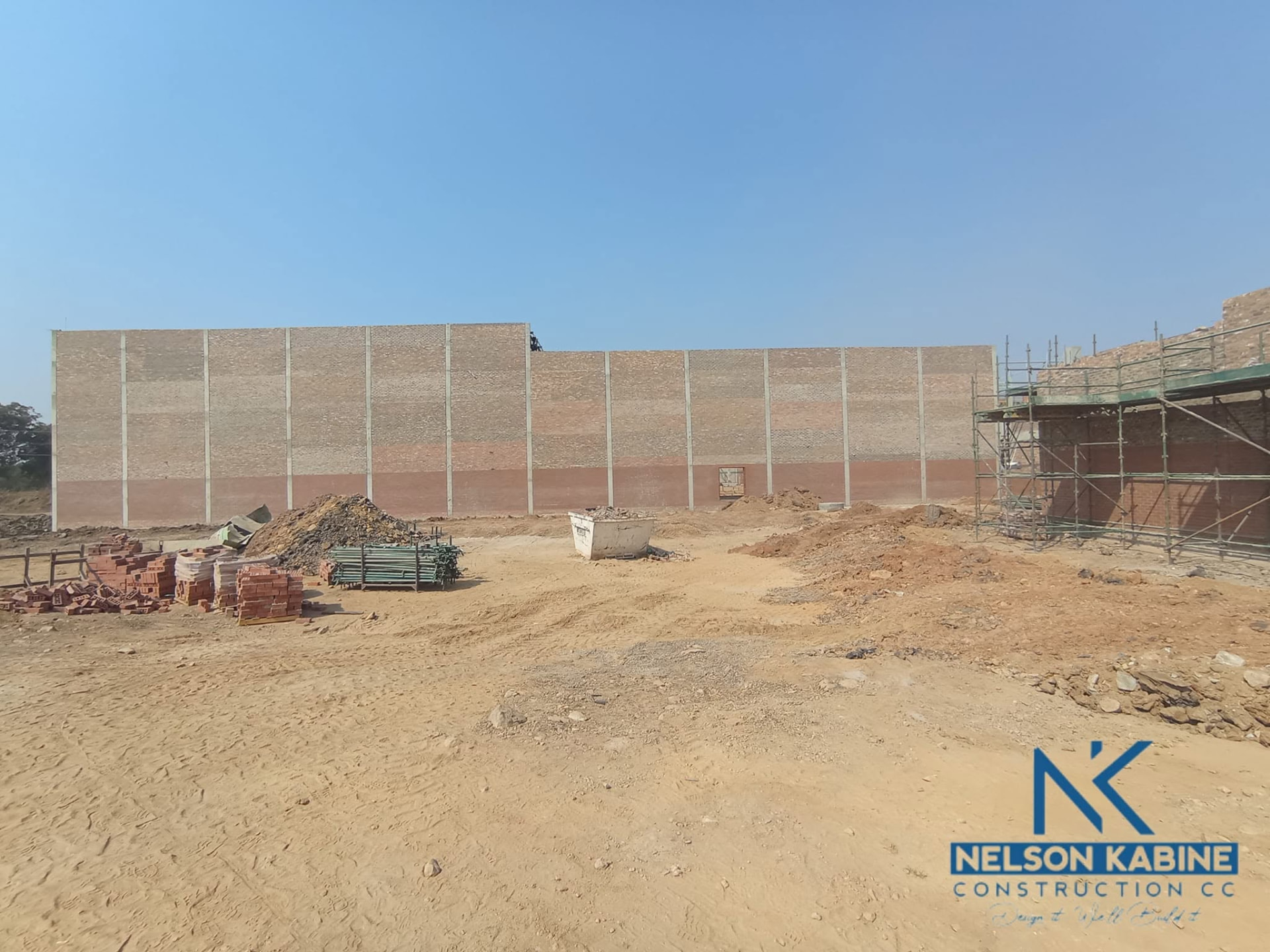Completed face-brick and column wall on an industrial building